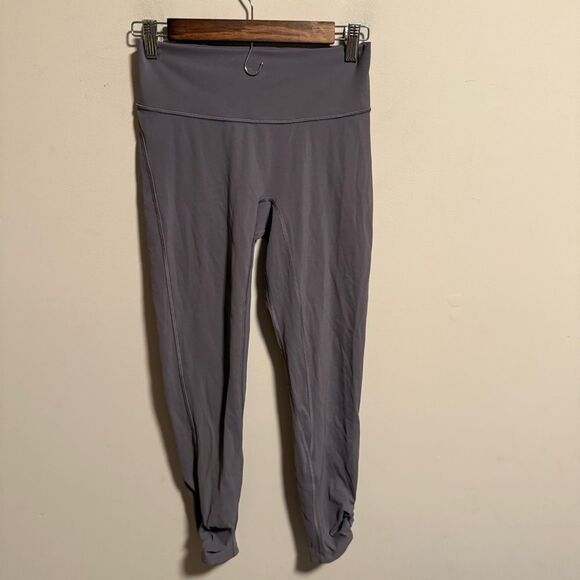 Lululemon Awakening Tight *Taryn Toomey Collection 25"
Magnum- Size 6 - Picture 4 of 8